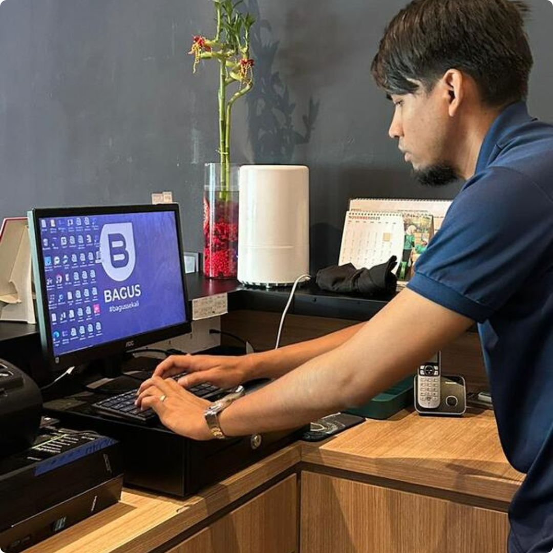 Staff operating Bagus POS terminal